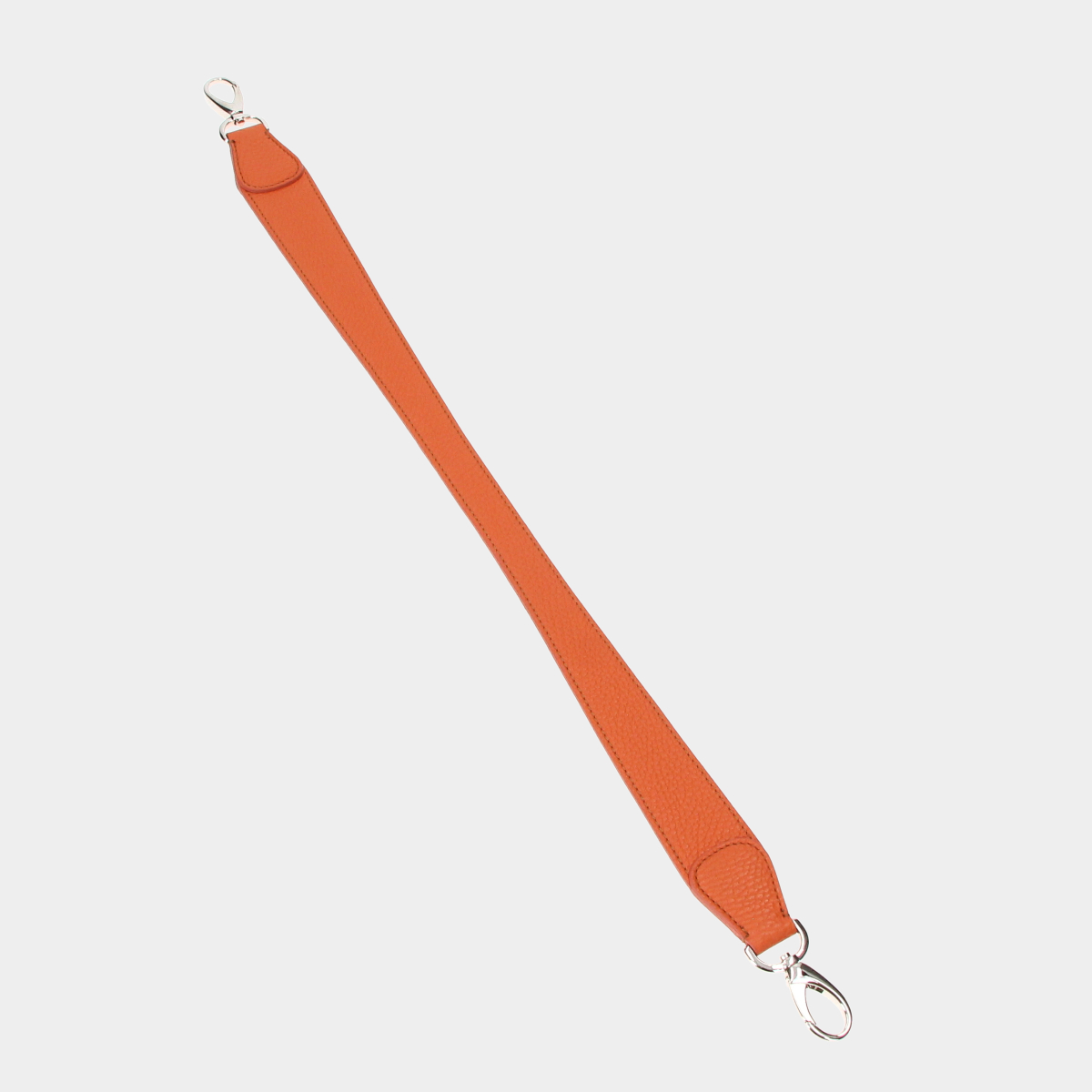 Levně Jednoduché krátké držadlo oranžová/stříbro